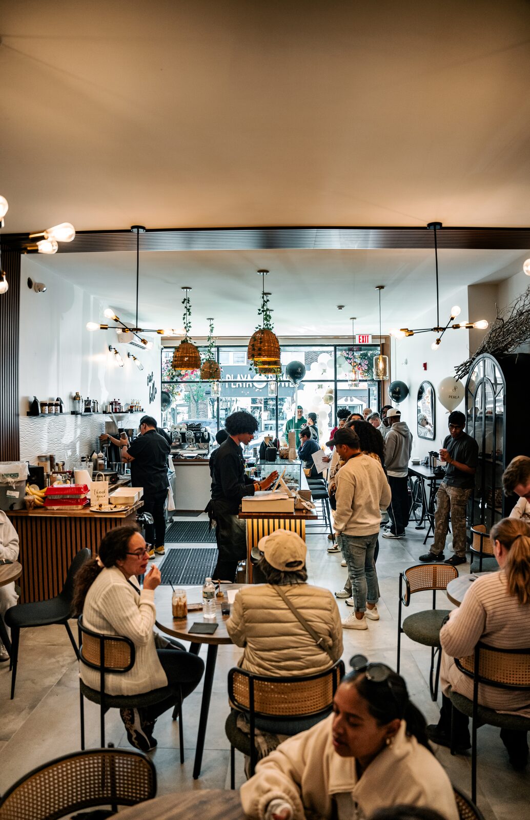 Customers gathered at the Perla espresso bar with balloons